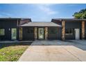Home with stone accents and large windows at 13600 Ponce De Leon Blvd, Brooksville, FL 34601