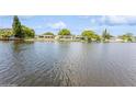 Tranquil waterfront view of several houses on a canal at 4145 Star Island Dr, Holiday, FL 34691