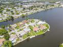 Aerial view showcasing a house on a private island at 4145 Star Island Dr, Holiday, FL 34691