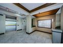 Concise image of a building's lobby, featuring an elevator and mailboxes at 2323 Feather Sound Dr # 202, Clearwater, FL 33762