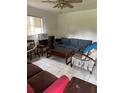 Living room featuring a sofa, chairs, and coffee table at 2317 8Th E Ave, Bradenton, FL 34208