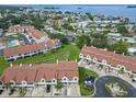 Aerial view of townhome community near the water at 2376 Hanover Dr, Dunedin, FL 34698