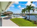 Private backyard oasis with pool, tiki bar, and dock access at 7850 2 S Ave, St Petersburg, FL 33707