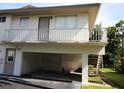 Two-story building with private parking and balconies at 1829 Bough Ave # 4, Clearwater, FL 33760