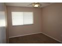Bright bedroom with ceiling fan and window blinds at 1829 Bough Ave # 4, Clearwater, FL 33760