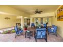 Relaxing patio area with comfortable seating and lush landscaping at 5775 Park N St # 411, St Petersburg, FL 33709