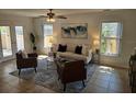 Bright living room with comfortable seating, modern decor, and natural light at 1740 51St N St, St Petersburg, FL 33710