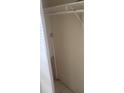 Empty closet with white walls and a single lightbulb at 6100 12Th S St # 211, St Petersburg, FL 33705