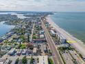 Aerial view of beachfront property and neighborhood at 14300 Gulf Blvd # 206, Madeira Beach, FL 33708