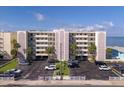 Exterior view of a beachside condo building at 14300 Gulf Blvd # 206, Madeira Beach, FL 33708
