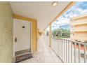 Hallway with white doors and tile flooring at 2506 N Rocky Point Dr # 274, Tampa, FL 33607