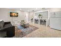 Bright living room featuring a stylish rug and comfortable seating at 2517 Trinidad St, Sarasota, FL 34231