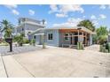 House exterior showcasing a side view and additional parking at 18053 2Nd E St, Redington Shores, FL 33708