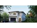 Charming two-story home boasting a modern design, clean lines, and inviting curb appeal at 1045 Conant Ave, Safety Harbor, FL 34695