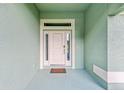 Inviting front door with a welcome mat at 105 Dartmouth Rd, Venice, FL 34293