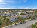 Aerial view showcasing the building with ample parking and surrounding neighborhood at 2353 Shelley St # 21, Clearwater, FL 33765