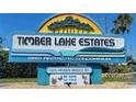 Community sign for Timber Lake Estates, a deed restricted condominium community at 3124 Pond Hollow St # 183, Wesley Chapel, FL 33543