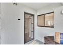 Condo entrance with screen door at 4823 Ebbtide Ln # 104, Port Richey, FL 34668