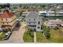 Stunning waterfront home featuring manicured landscaping, brick driveway, and boat access on a sunny day at 13753 Judy Ave, Hudson, FL 34667