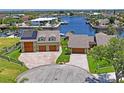 Two houses with waterfront access and solar panels at 3154 Brigantine Ct, New Port Richey, FL 34652