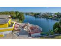 Elevated deck overlooking a canal with waterfront homes, showcasing scenic views at 4040 Hermosa Blvd, Hernando Beach, FL 34607