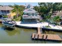 Coastal home with dock, boat lift, and waterfront access at 6629 Harbor Dr, Hudson, FL 34667