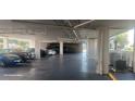 Condo parking garage with ample space for residents' vehicles at 8210 Aquila St # 226, Port Richey, FL 34668