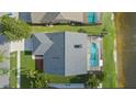 Aerial view of house with pool and backyard at 8629 Boysenberry Dr, Tampa, FL 33635