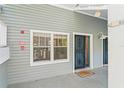 Private condo entrance with security door at 2511 Dolly Bay Dr # 308, Palm Harbor, FL 34684