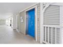 Clean condo hallway with elevator access at 2511 Dolly Bay Dr # 308, Palm Harbor, FL 34684