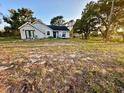House with a large, unlandscaped front yard at 2013 Finland Dr, Spring Hill, FL 34609
