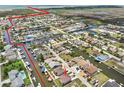 Aerial view showing home location and canal access at 7332 Islander Ln, Hudson, FL 34667