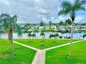 Scenic water view showcasing lush landscaping and serene waters at 4632 Marine Pkwy # 302, New Port Richey, FL 34652