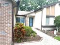 Brick walkway leading to front entrance of home at 7278 Scotland Cir, Weeki Wachee, FL 34613