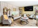Living room featuring a neutral color scheme and hardwood floors at 11836 Carissa Ln # B, New Port Richey, FL 34654