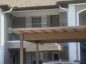 Exterior view of building and carport at 5265 E Bay Dr # 420, Clearwater, FL 33764