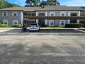 Two-story building with covered parking at 5265 E Bay Dr # 420, Clearwater, FL 33764