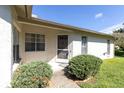 One-story house with front door and landscaping at 4750 Carrington Ct, New Port Richey, FL 34655