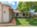 House exterior showcasing walkway and landscaping at 7208 Clouchester Ct, Hudson, FL 34667