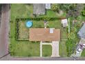 Aerial view showing the house, backyard, and pool at 800 61St N St, St Petersburg, FL 33710