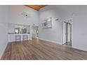 Bright living room featuring hardwood floors, an open layout, and contemporary decor at 8210 Aquila St # 227, Port Richey, FL 34668