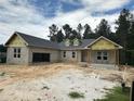 Block home under construction with gray roof at 4676 Hickory Oak Dr, Brooksville, FL 34601