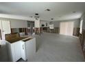 Under renovation, features new tile flooring and exposed walls at 7332 Mako Dr, Hudson, FL 34667