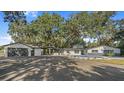 Modern home with detached garage and pool at 18101 Mason Smith Rd, Brooksville, FL 34604