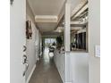Bright and spacious entryway with views into the living area and kitchen at 1847 Shore S Dr # 614, South Pasadena, FL 33707