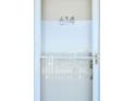 White front door with the number 614 at 1847 Shore S Dr # 614, South Pasadena, FL 33707