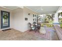 Relaxing front porch with seating and a welcoming atmosphere at 203 S Spring Blvd, Tarpon Springs, FL 34689