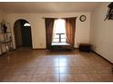 Cozy living room featuring tile flooring and a window seat with views at 12266 Birch St, Brooksville, FL 34613
