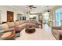Open living room with a view of the kitchen and dining area at 12289 Glen Haven St, Spring Hill, FL 34609