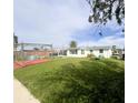 Spacious backyard featuring a wooden deck with a unique above-ground pool, offering outdoor relaxation at 13639 Frances Ave, Hudson, FL 34667